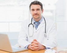 depositphotos_39179963-stock-photo-male-doctor-with-laptop-at